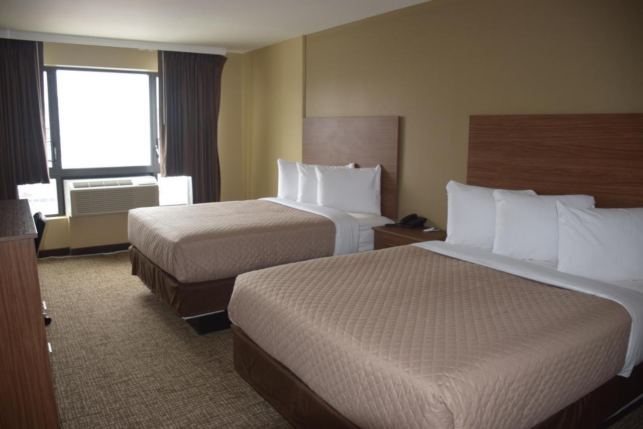 Astoria Delancy Inn & Suites Нью-Йорк Екстер'єр фото